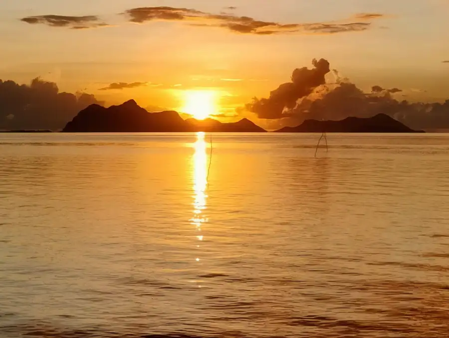 Beautiful tropical sunset viewed from the resort Asia Rainforest Resort